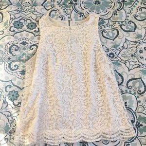 White lace sleeveless with zip on back